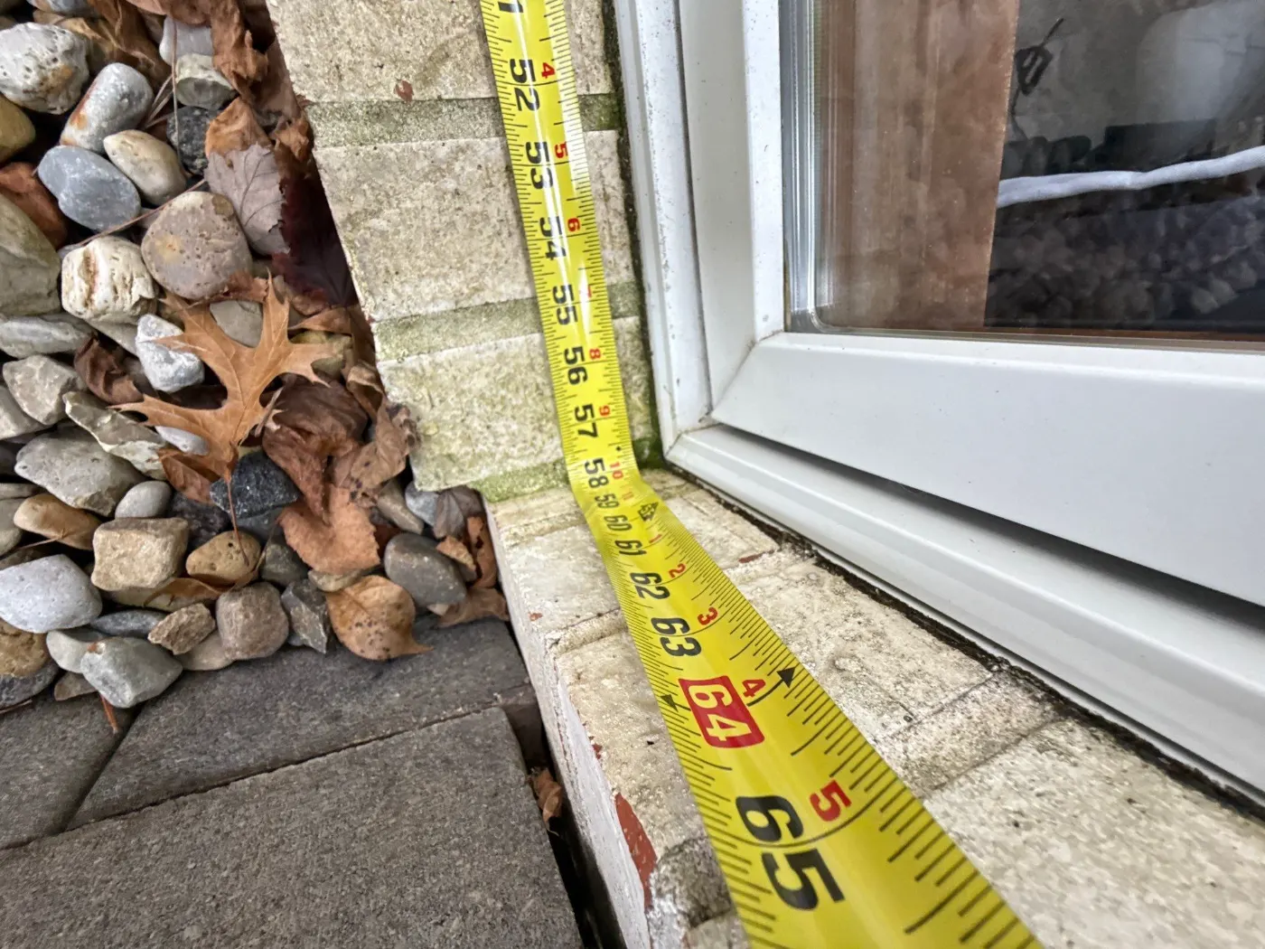 Storm-damaged window documented in Ellettsville